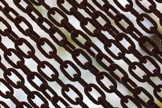 Rusty chains. Background of chains on a withe background. Rust Anchor Chain. Curtain of old chain-link. Background of metal chains, old used chain.