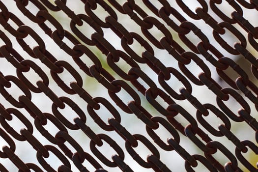 Rusty chains. Background of chains on a withe background. Rust Anchor Chain. Curtain of old chain-link. Background of metal chains, old used chain.