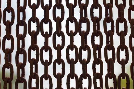 Rusty chains. Background of chains on a withe background. Rust Anchor Chain. Curtain of old chain-link. Background of metal chains, old used chain.