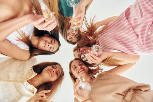 Having fun. Group of happy women that is at a bachelorette party.