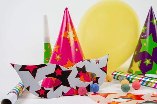 Colorful party items for birthday on a white background