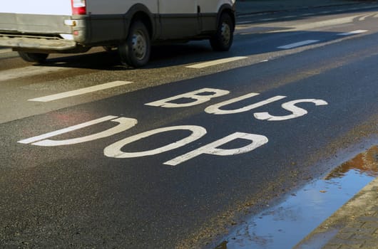 Dedicated for public transport lane on the road with the inscription - BUS DOP. Public transport