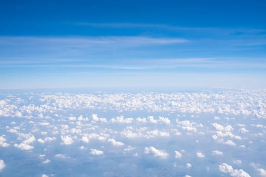 Cloud texture and blue sky by airplane