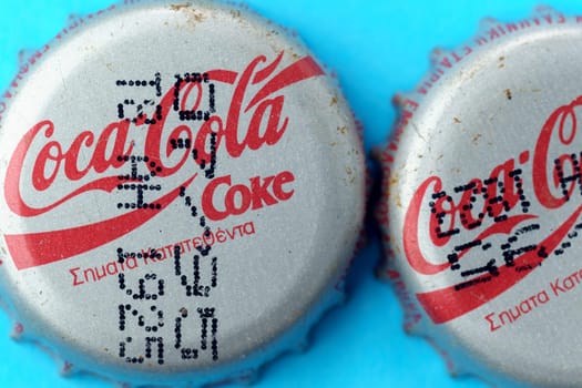 Tyumen, Russia-February 15, 2023: Vintage Coca Cola bottle cap. 1995 design, close-up selective focus