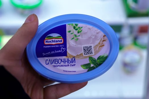 Tyumen, Russia-March 17, 2023: Hohland, cream cheese. Produced by Hochland, founded in Germany in 1927