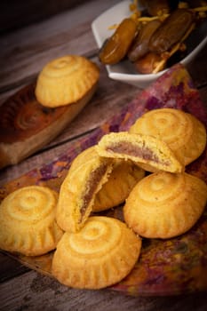 Traditional eid maamoul or mamoul cookies with dates, nuts, and jam, Arabic sweets for Aid al-Fitr and easter, High quality photo