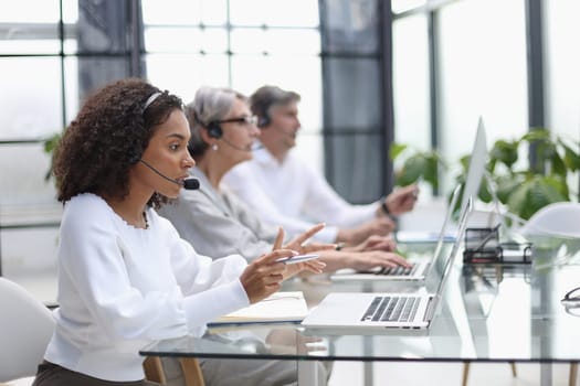 Business group working in customer and help desk office.