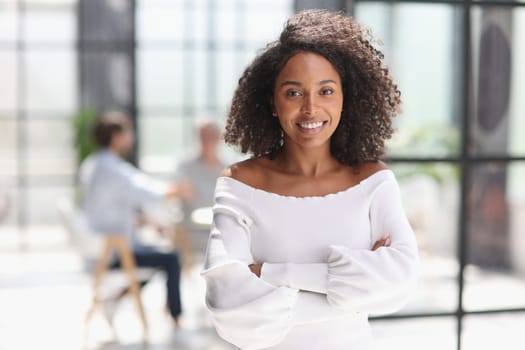 Portrait of an African American young business woman working in the office