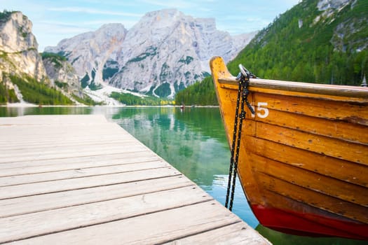 Boat on the Lake Braies in Dolomites mountains, Italy. Picturesque Italian landscape.