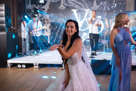 the first dance  bride inside a restaurant with heavy smoke