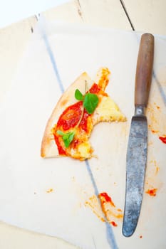 Italian traditional pizza Margherita tomato mozzarella and basil