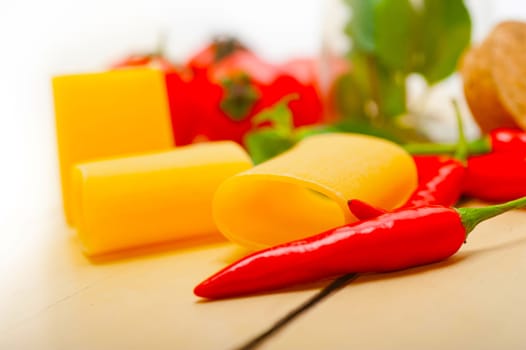 Italian pasta paccheri or schiaffoni with tomato mint and chili pepper ingredients