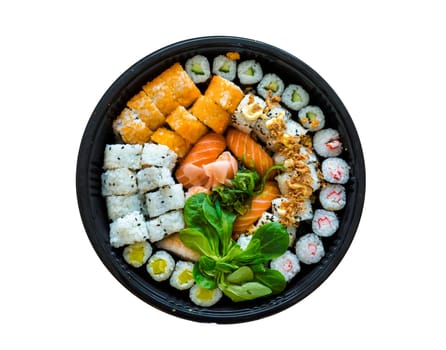 A fresh platter of sushi with rice and fish isolated on white background