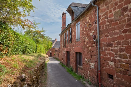 Collonges la Rouge, distinctive red brick houses and towers of the medieval Old Town, France. it is the first member of the Plus Beaux Villages de France nomination most beautiful villages of France