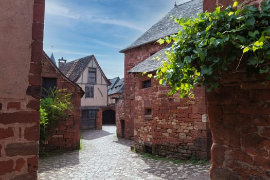 Collonges la Rouge, distinctive red brick houses and towers of the medieval Old Town, France. it is the first member of the Plus Beaux Villages de France nomination most beautiful villages of France