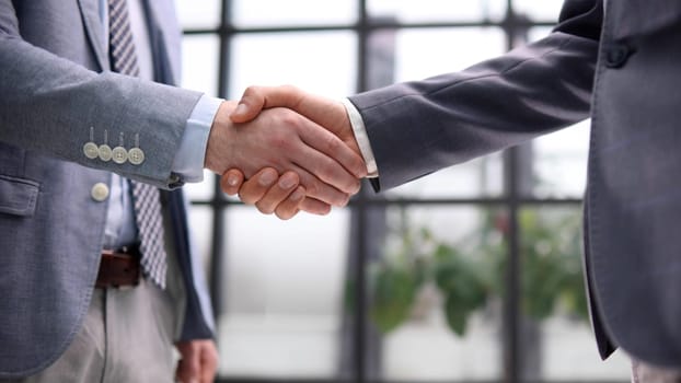 closeup shot of businessmen shaking hands