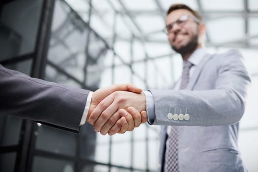 Business people shaking hands, finishing up meeting
