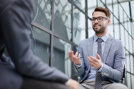 Confident senior manager working together with new employee.