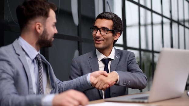 Let me explain. a group of corporate business colleagues having a meeting around the table in the boardroom.