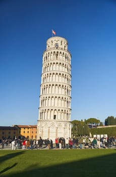 Pisa, Italy - 13.02.2023: View of the Leaning Tower of Pisa on a sunny day in the city of Pisa, Italy.