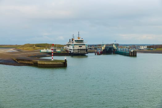the port of the island of Texel with the ferry ready to sail to the mainland to Den Helder