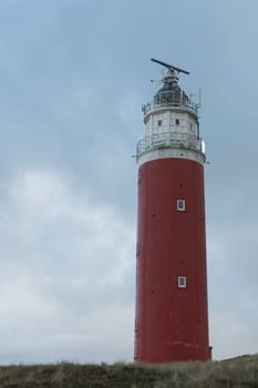 Red lighthouse at the little isle of Texel, the Netherlands