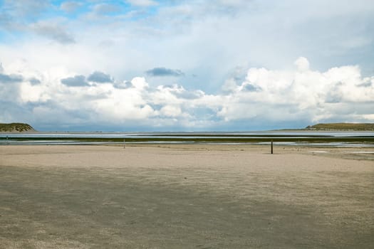 the entire wide sandy beach at De Slufter on the island of Texel in the Wadden Sea near the Netherlands