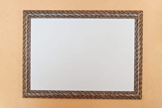 Photo frame with single white image on pink wall