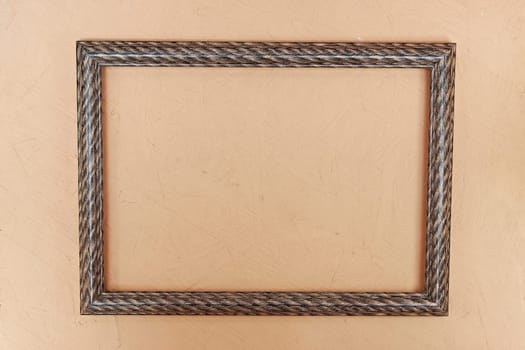 Photo frame with single white image on pink wall