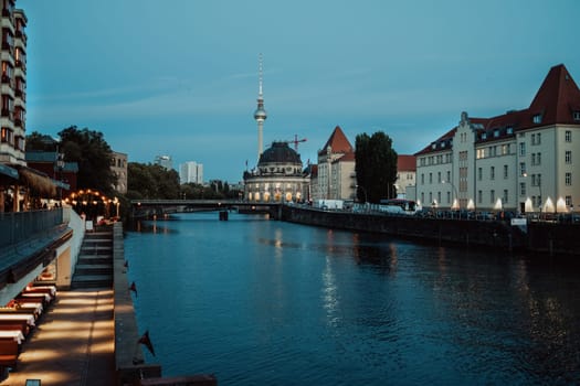 March 2023 - Berlin, Germany. Night view to river Spree. Beautiful panorama. High quality photo
