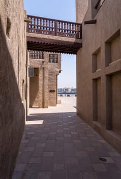 Narrow street leading to the Creek in the Al Shindagha district and museum in Bur Dubai