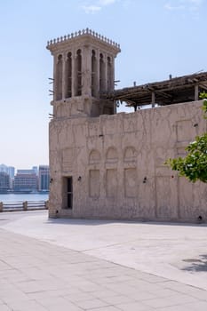 Wide promenade by a traditional house along the Creek in the Al Shindagha district in Bur Dubai