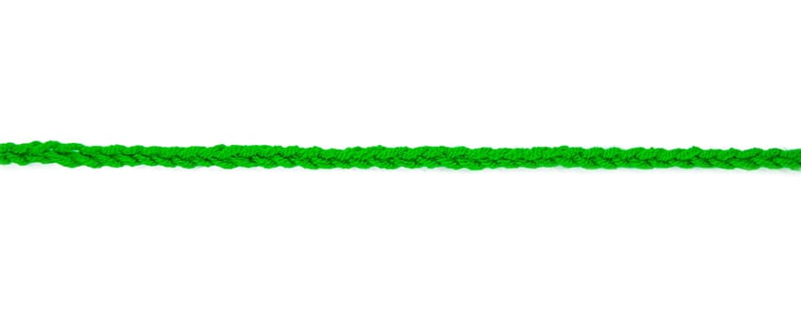Green thread isolate on white background. Selective focus. Color.