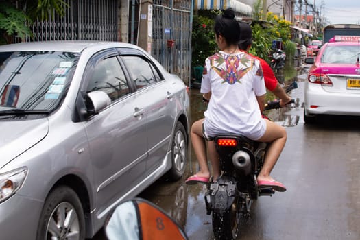 Bangkok, Thailand - September 25, 2016 : Water flood in Bangkok city problem with the manhole overflow in drainage system it full from garbage when rain storm.