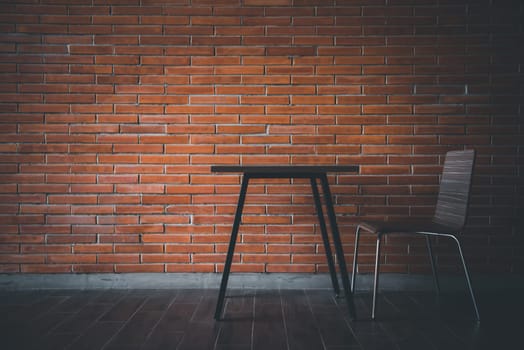 Cafe or restaurant in balcony view decorate with red brick wall and table chairs set for seating relax