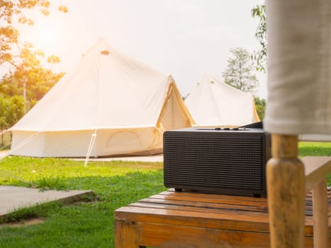 Camping picnic tent campground in outdoor hiking forest. Camper while campsite in nature background at summer trip camp. Adventure Travel Vacation concept
