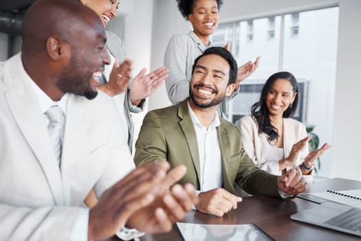 Clapping, laptop and business people in meeting for proposal, logo or reveal in office. Team, applause and corporate success by group celebrating achievement, project and job well done together.