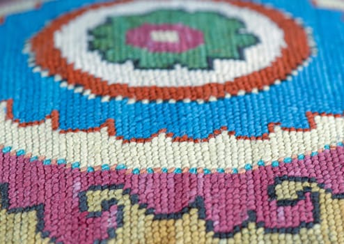 A closeup shot of national ornaments and patterns of Central Asia on a piece of cloth