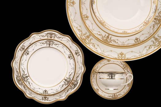 A luxury tableware set isolated on black background