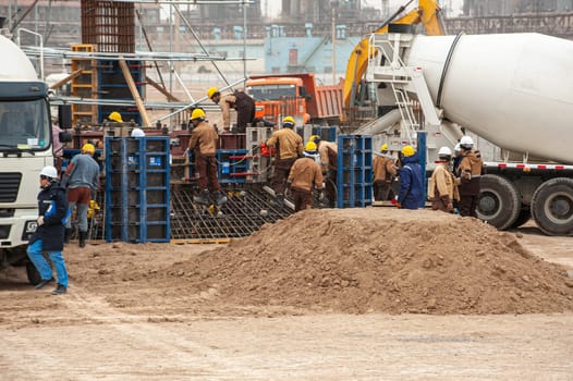 An oil and gas industry with an industrial construction view with tracks and tools outdoors