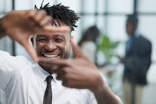 young african american man making a square with his hands