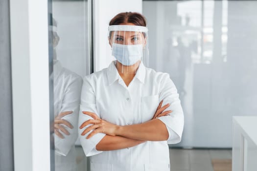Caucasian ethnicity. Professional medic in white coat is in the clinic.
