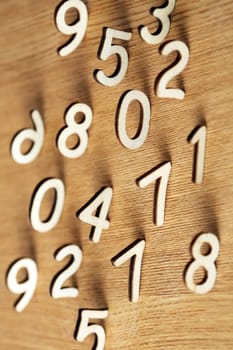 Mathematical concept. Set of numbers on wooden background