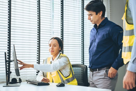 Competent engineers create blueprints and plans and present them to their boss. Architectural investors working with engineers for engineering project.