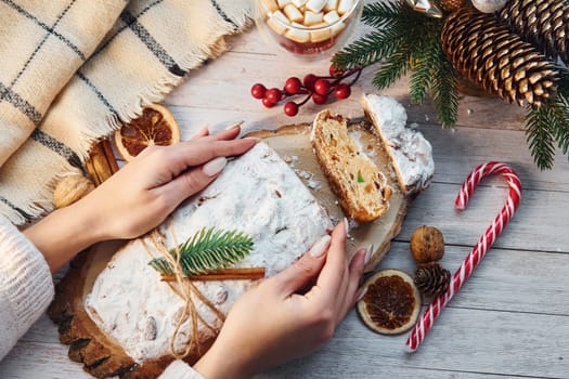 Stollen with holiday decorations. Christmas background.