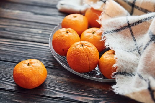 Fresh oranges. Christmas background with holiday decoration.