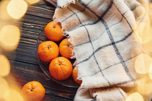 Fresh oranges. Christmas background with holiday decoration.