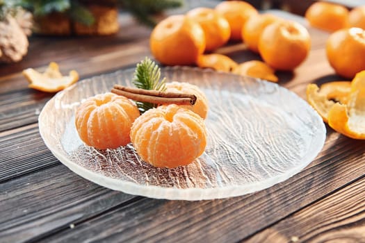 Fruits is on the table. Christmas background with holiday decoration.