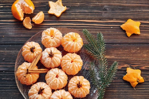 Many of the oranges. Christmas background with holiday decoration.