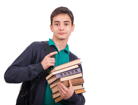 schoolboy holding a stack of books, textbook isolated on white background .